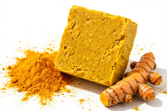 Handcrafted turmeric soap bar with turmeric powder and fresh turmeric root